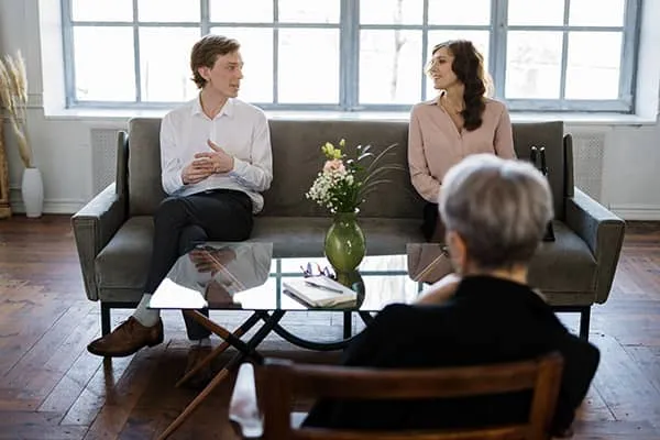 Coach and client interacting during a coaching session